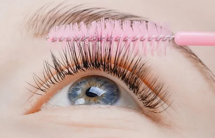 Use a soft brush or a lint-free applicator to gently swipe along the lash line