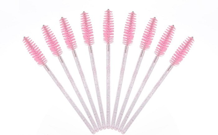 A spoolie brush is a common and versatile tool for combing eyelashes